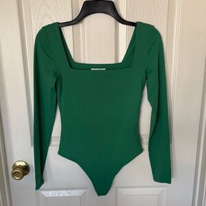Aritzia Babaton  Bodysuit; size small; NWOT; PLEASE NOTE: THE TAG IS CUT OUT